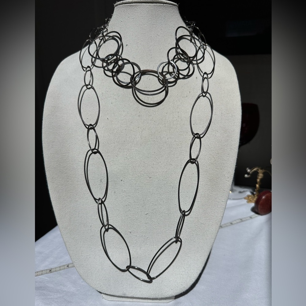 Two abstract gun metal gray necklaces
